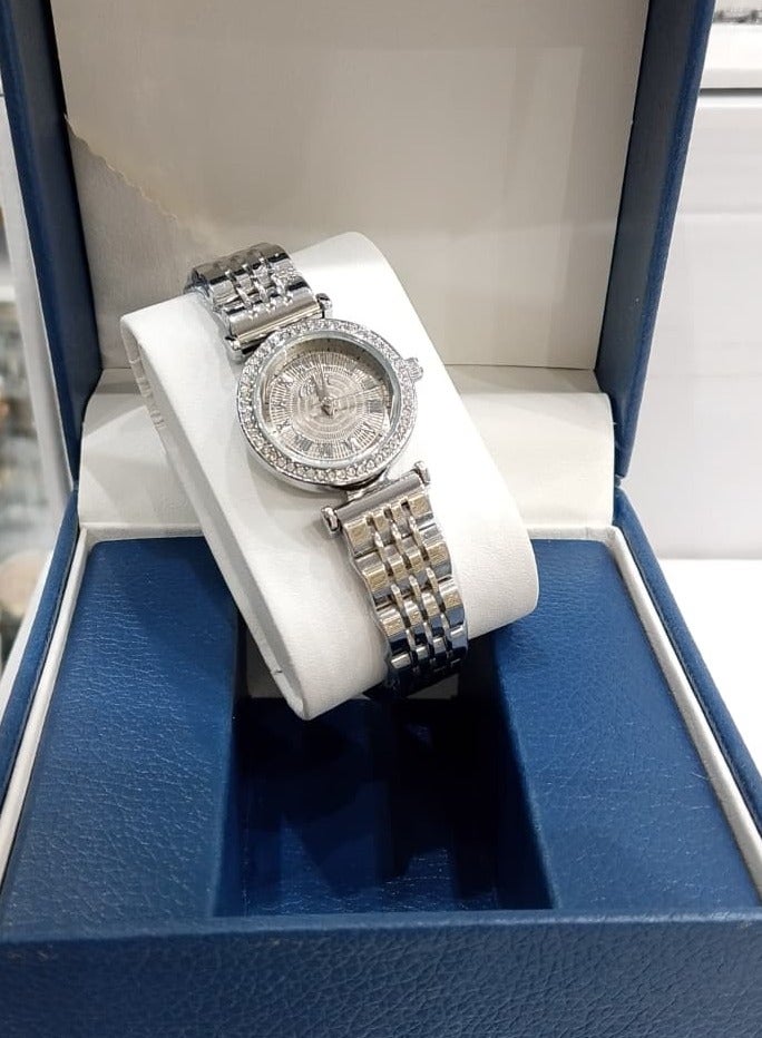 Women's watch adorned with crystals, featuring an elegant and luxurious design.
